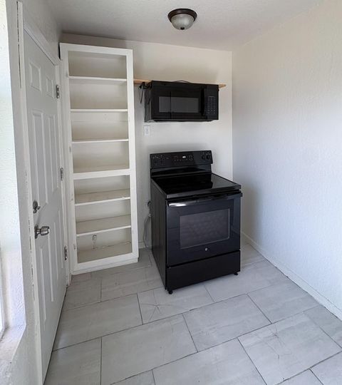 Tiny photo for 1207 W 9th Street, Freeport, TX 77541 (MLS # 48794410)