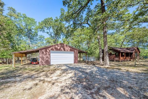 Photo of 130 Hilltop Lsv Drive, Huntsville, TX 77320 (MLS # 38604807)