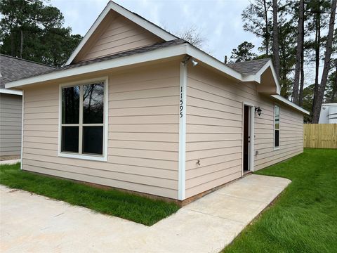 Photo of 11595 Persimmon Street, Willis, TX 77318 (MLS # 89889783)