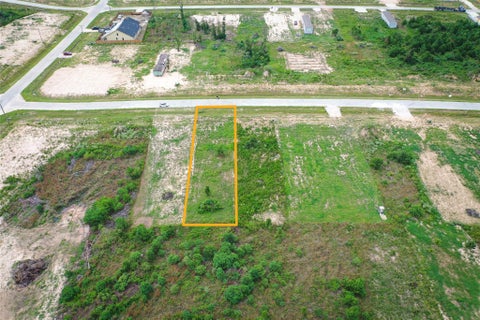 Photo of 540 Road 5705, Cleveland, TX 77327 (MLS # 33506783)
