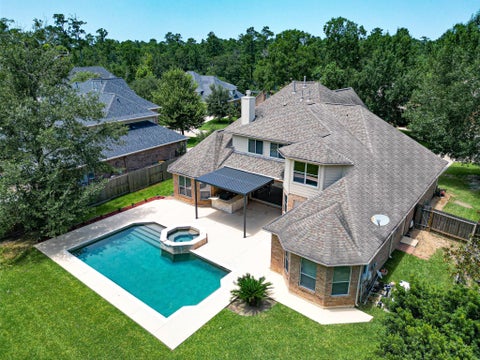 Photo of 45 Marquise Oaks Place Place, The Woodlands, TX 77382 (MLS # 75759236)