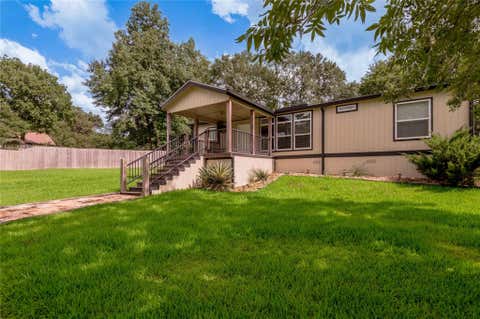 Photo of 3011 Simmons Street, Huntsville, TX 77320 (MLS # 31419230)