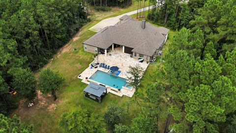 Photo of 130 Bighorn Road, Huntsville, TX 77340 (MLS # 41281438)