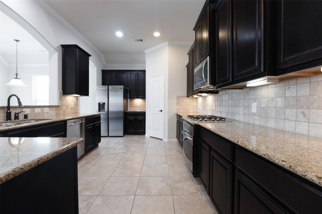 Photo of 17230 Lowell Lake Lane, Humble, TX 77346 (MLS # 33449320)
