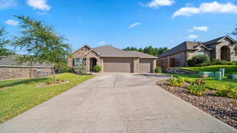 Photo of 12348 Delta Timber Road, Conroe, TX 77304 (MLS # 64416826)