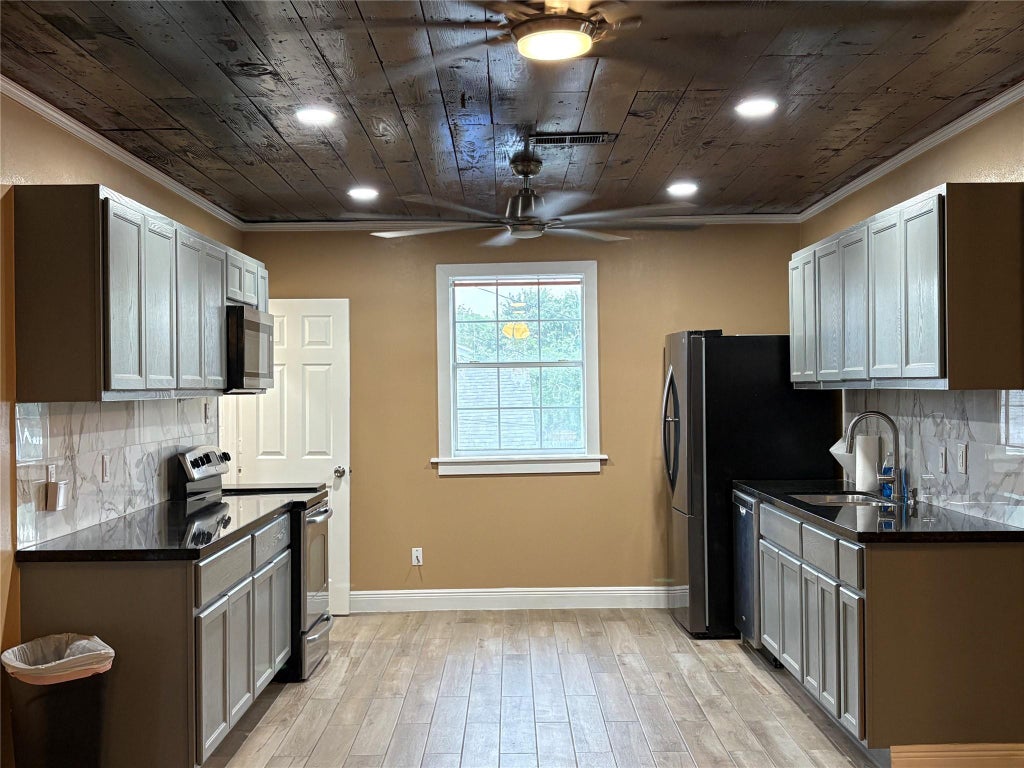 Photo of 4817 Avenue Q 1/2, Galveston, TX 77551 (MLS # 62186378)