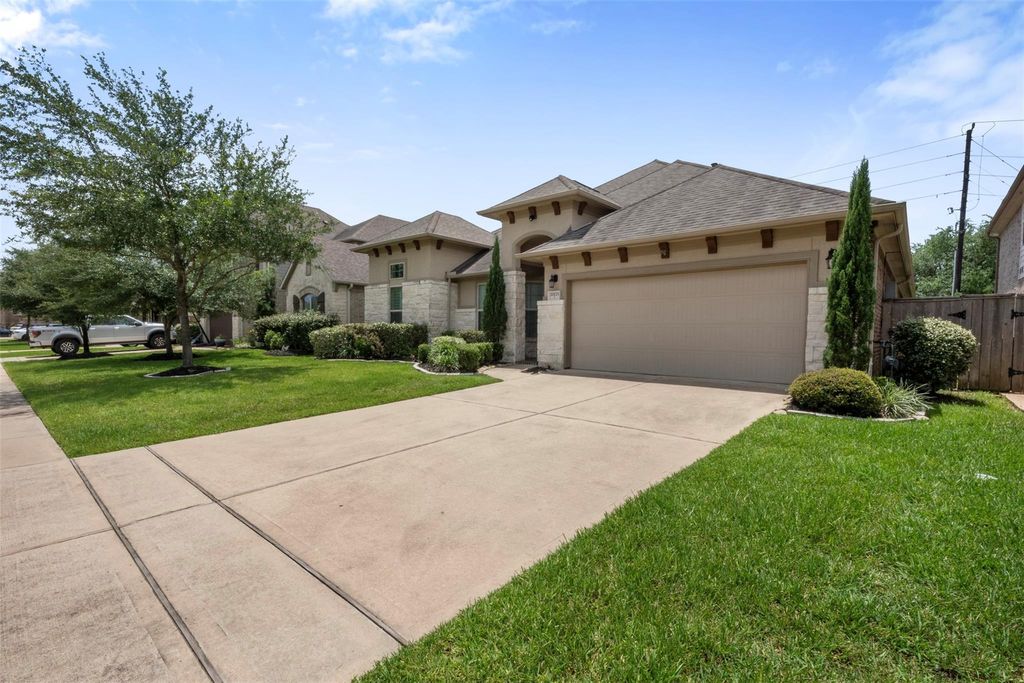 Photo of 20123 Cascading Falls Boulevard, Cypress, TX 77433 (MLS # 27582513)