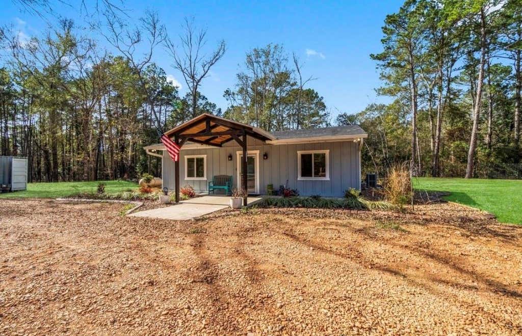 Photo of 7711 Boars Head Place, Montgomery, TX 77316 (MLS # 92287540)