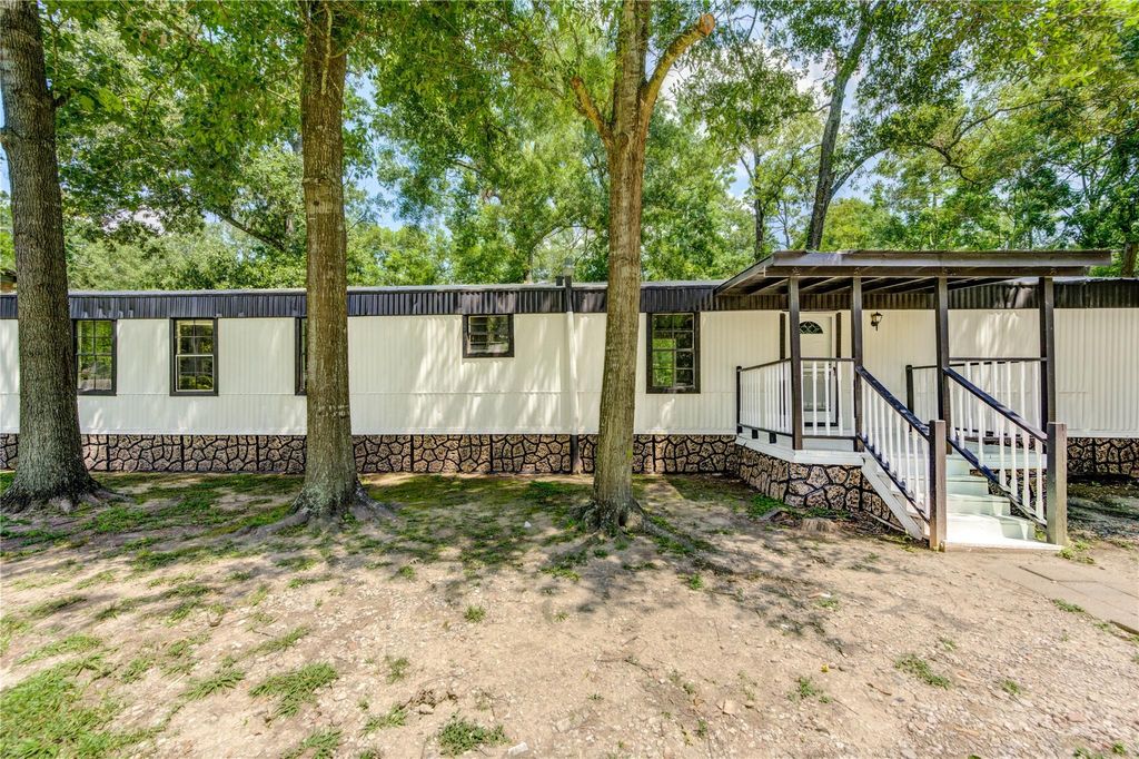 Photo of 26342 Hunters Trail, New Caney, TX 77357 (MLS # 82842139)