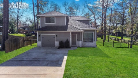 Photo of 10410 Royal Magnolia Drive, Conroe, TX 77303 (MLS # 20125006)