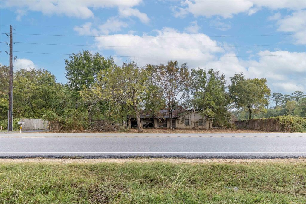 Photo of 615 Cove Road, Baytown, TX 77523 (MLS # 66678696)