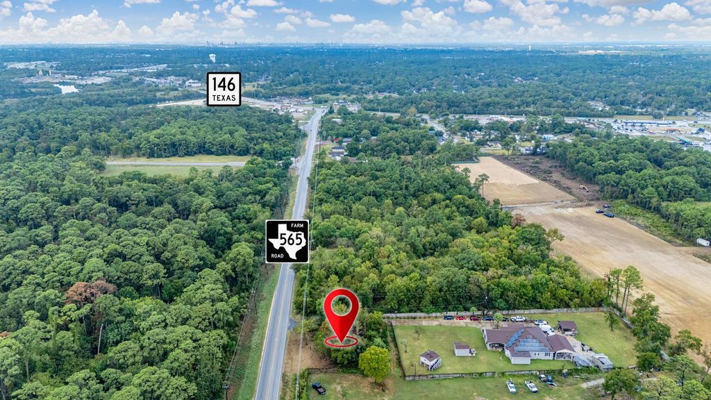 Photo of 615 Cove Road, Baytown, TX 77523 (MLS # 66678696)