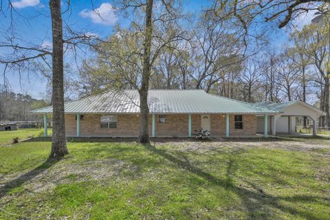 Photo of 121 Magnolia Boulevard, New Caney, TX 77357 (MLS # 33820653)