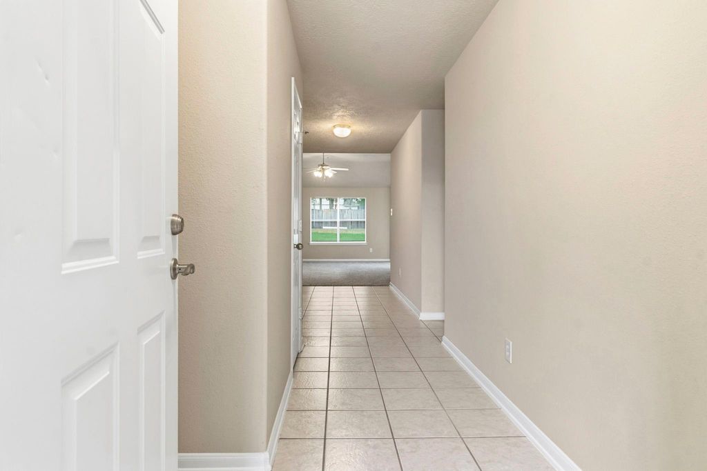 Photo of 13730 Running Bear Drive, Willis, TX 77378 (MLS # 9385550)