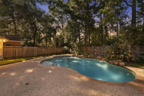Photo of 78 E Hobbit Glen Drive, Conroe, TX 77384 (MLS # 56928049)