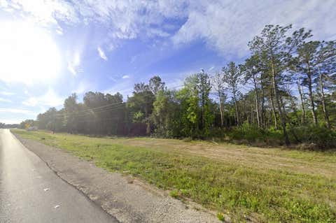 Photo of 9 Highway 105 Highway, Cleveland, TX 77328 (MLS # 21226921)