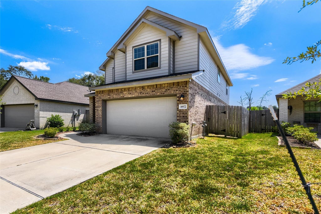 Photo of 18972 Caney Forest Drive, Roman Forest, TX 77357 (MLS # 59264124)