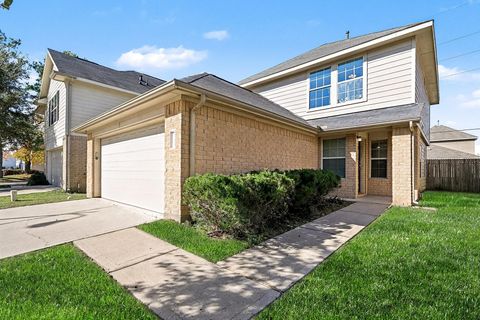 Photo of 882 Darbydale Crossing Lane, Houston, TX 77090 (MLS # 65548384)