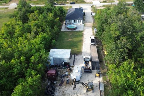 Photo of 143 County Road 5134, Cleveland, TX 77327 (MLS # 33761597)