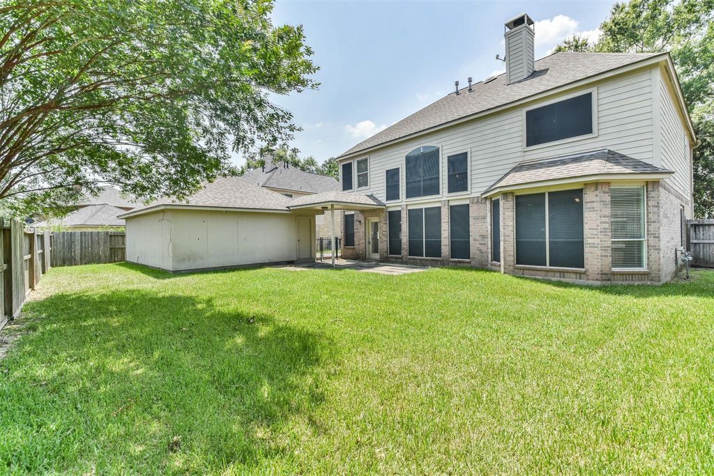 Photo of 18802 Half Volley Circle, Humble, TX 77346 (MLS # 67532612)