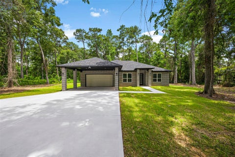Photo of 172 County Road 3669 N, Splendora, TX 77372 (MLS # 18932888)