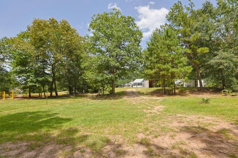 Photo of 7420 Jackson Road, Montgomery, TX 77316 (MLS # 94949467)