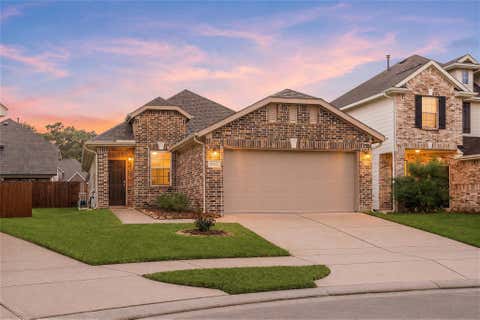 Photo of 10422 Milford Woods Lane, Tomball, TX 77375 (MLS # 2074721)