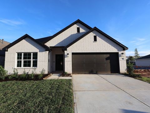 Photo of 136 Wasatch Peaks Way, Willis, TX 77378 (MLS # 91746113)