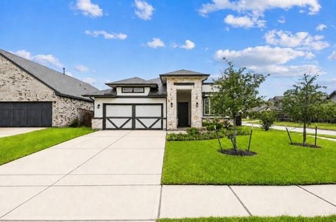 Photo of 6027 Thief River Falls Drive, Katy, TX 77493 (MLS # 20484205)