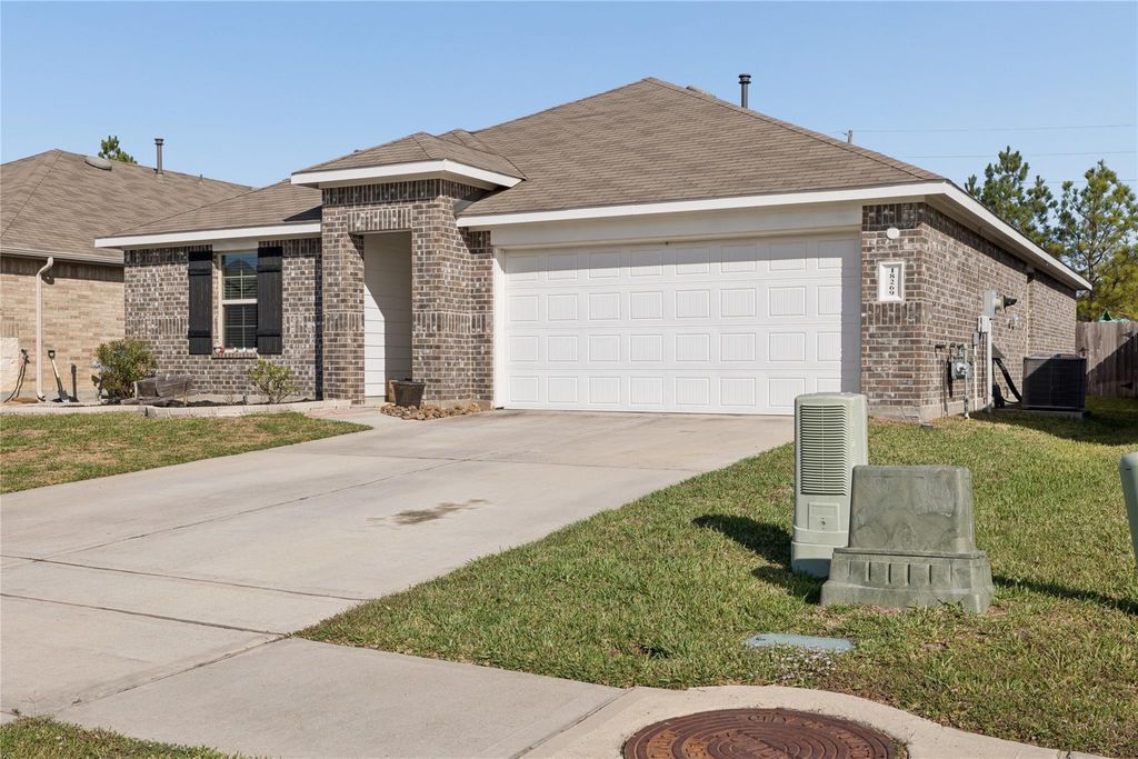 Photo of 18269 Eaton Mill Drive, New Caney, TX 77357 (MLS # 90791118)