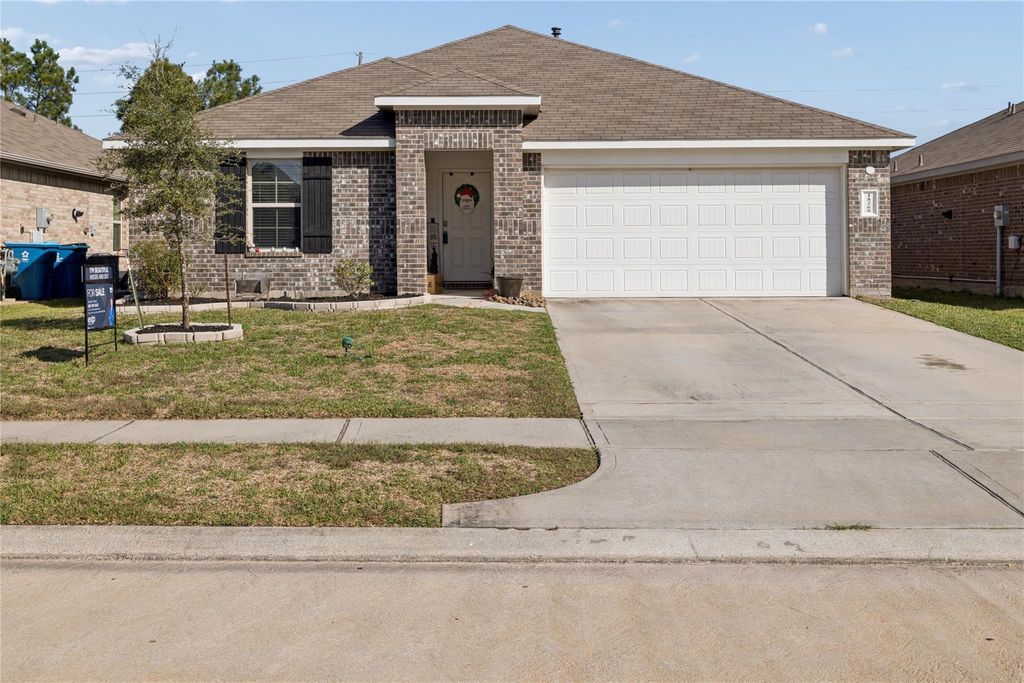 Photo of 18269 Eaton Mill Drive, New Caney, TX 77357 (MLS # 90791118)