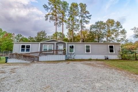 Photo of 7715 Walnut Tree Lane, Plantersville, TX 77363 (MLS # 11907891)