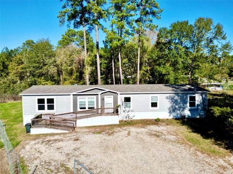 Photo of 7715 Walnut Tree Lane, Plantersville, TX 77363 (MLS # 11907891)