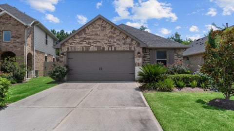 Photo of 9257 Inland Leather Lane, Conroe, TX 77385 (MLS # 81331570)