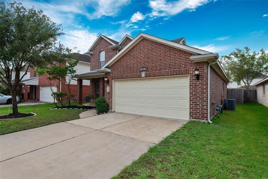 Photo of 10039 Noisy Waters Drive, Houston, TX 77095 (MLS # 88054494)