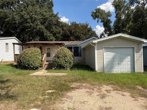 Photo of 15198 Paradise Cove Drive, Willis, TX 77318 (MLS # 35092289)
