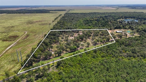 Photo of 1977 County Road 105, Devers, TX 77538 (MLS # 3076995)