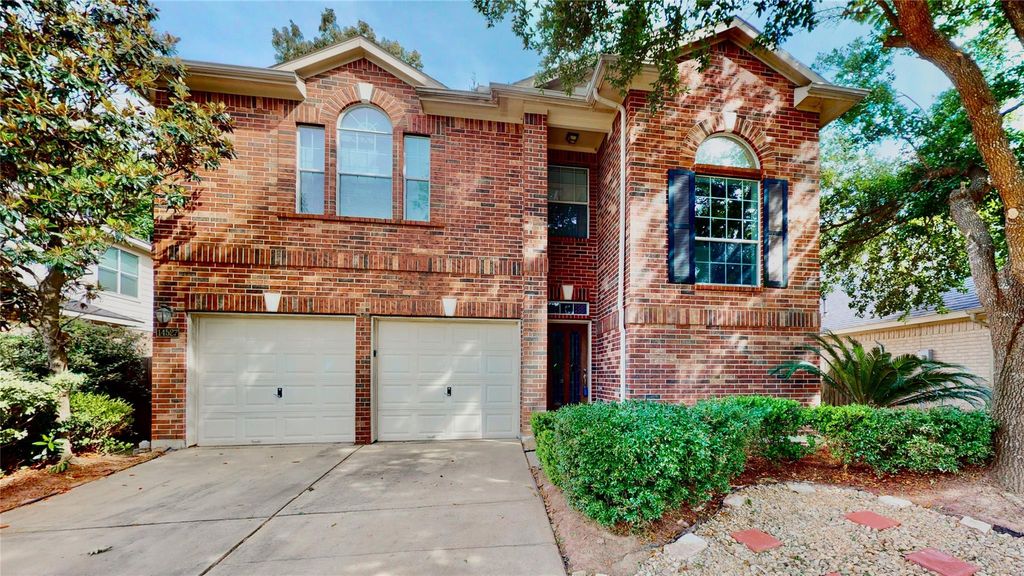 Photo of 14527 Eastern Redbud Lane, Houston, TX 77044 (MLS # 62098321)