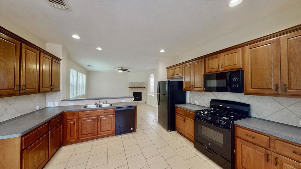 Photo of 14527 Eastern Redbud Lane, Houston, TX 77044 (MLS # 62098321)