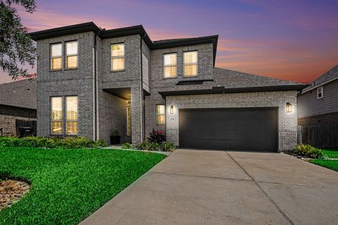 Photo of 9214 Secretariat Lane, Mont Belvieu, TX 77523 (MLS # 9543963)