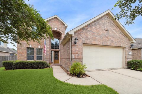 Photo of 13711 Mckinney Creek Lane, Houston, TX 77044 (MLS # 27545168)