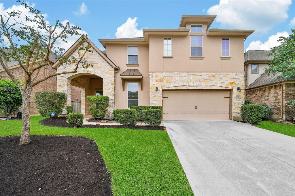 Photo of 27 Waterfall Way, Tomball, TX 77375 (MLS # 83676867)