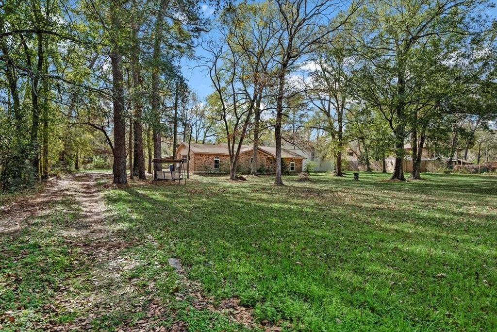 Photo of 504 Catfish Lane, Conroe, TX 77384 (MLS # 64989801)