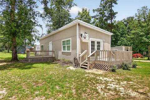 Photo of 290 Magnolia Road, Cleveland, TX 77328 (MLS # 74618745)