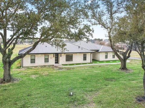 Photo of 4002 Dixie Farm Road, Pearland, TX 77581 (MLS # 13367182)