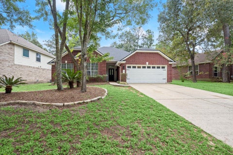 Photo of 34 S Rambling Ridge Place, Conroe, TX 77385 (MLS # 56478794)