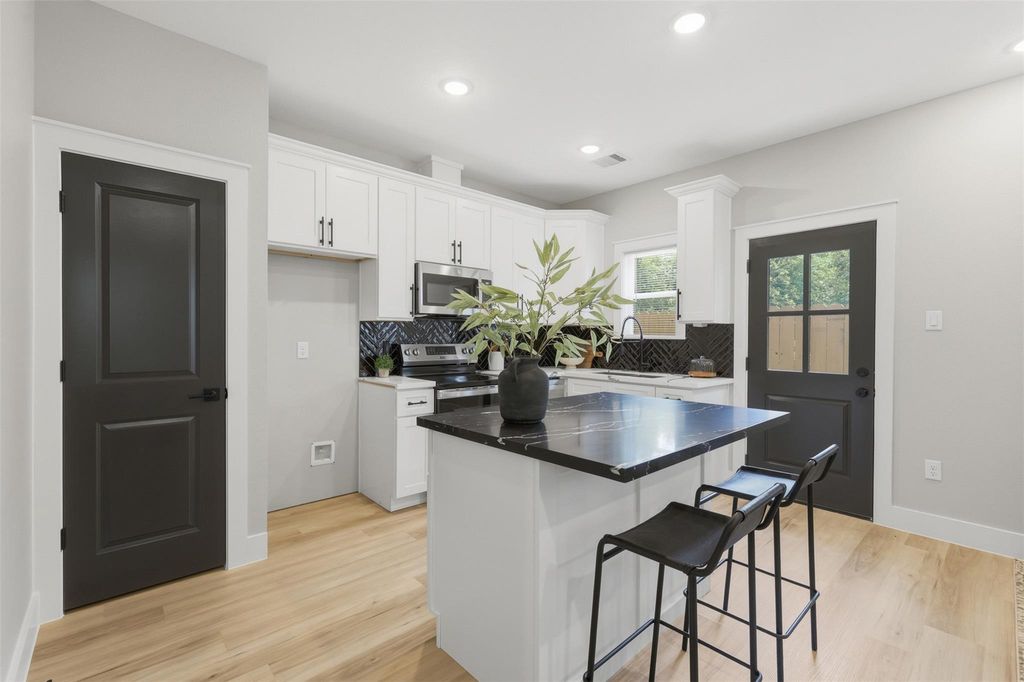 Photo of 4719 Mallow Street, Houston, TX 77033 (MLS # 97797071)