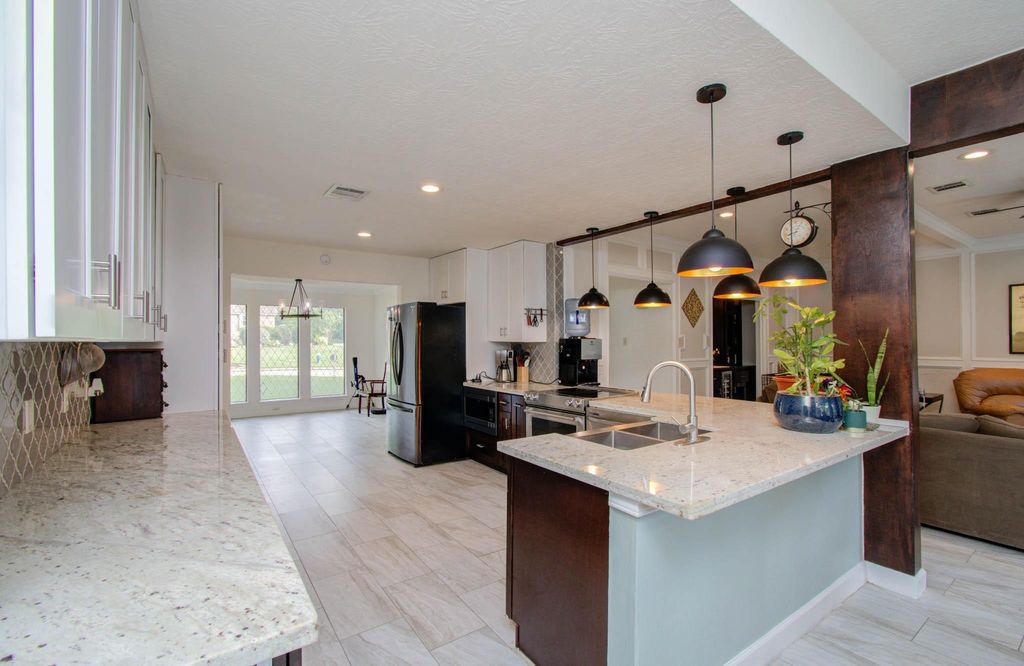Photo of 5422 Windy Lake Drive, Houston, TX 77345 (MLS # 31980266)