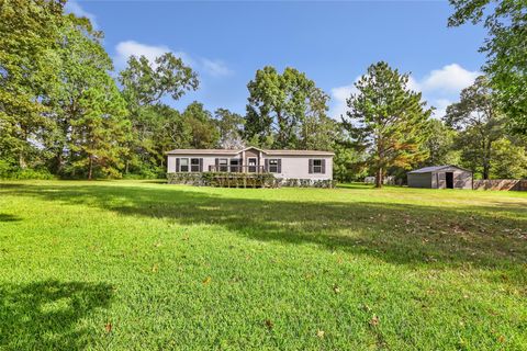 Photo of 40 County Road 2180, Cleveland, TX 77327 (MLS # 74004875)