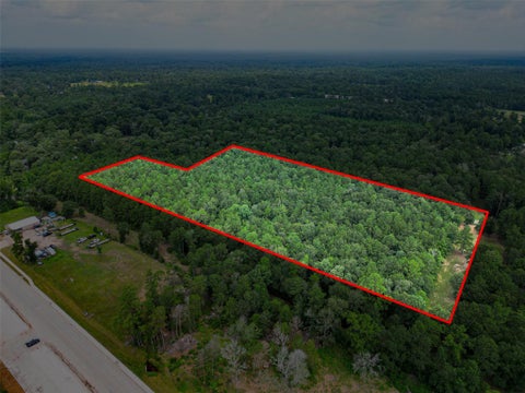 Photo of TBD S Duck Creek Road, Cleveland, TX 77328 (MLS # 81090560)